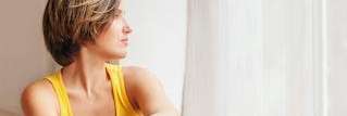 A lady relaxing after tooth extraction at Central Park Dental Clinic