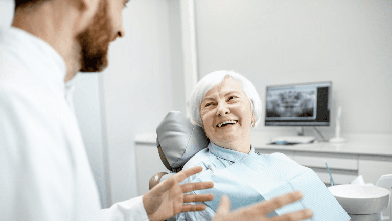 an elderly lady getting ready for Partial Dentures in Burnaby, BC