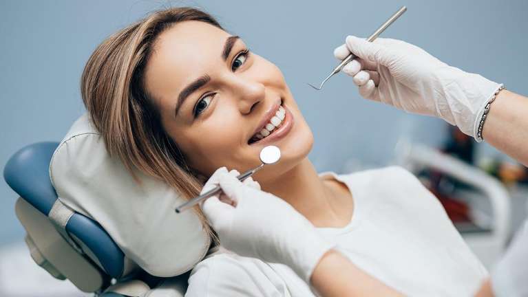 A female patient during to a Dental Clinic in Burnaby BC