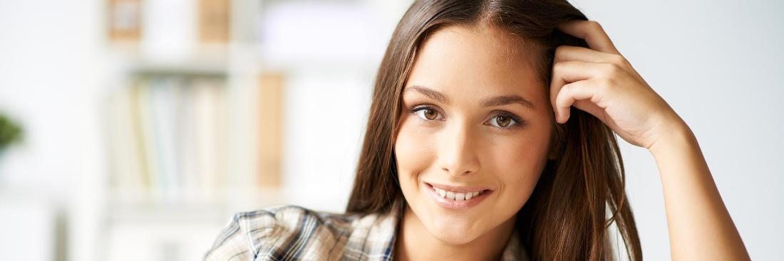 Woman smiling after getting veneers in Burnaby, BC