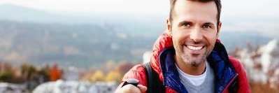 Patient smiling after cosmetic dentistry at Central Park DentalClinic