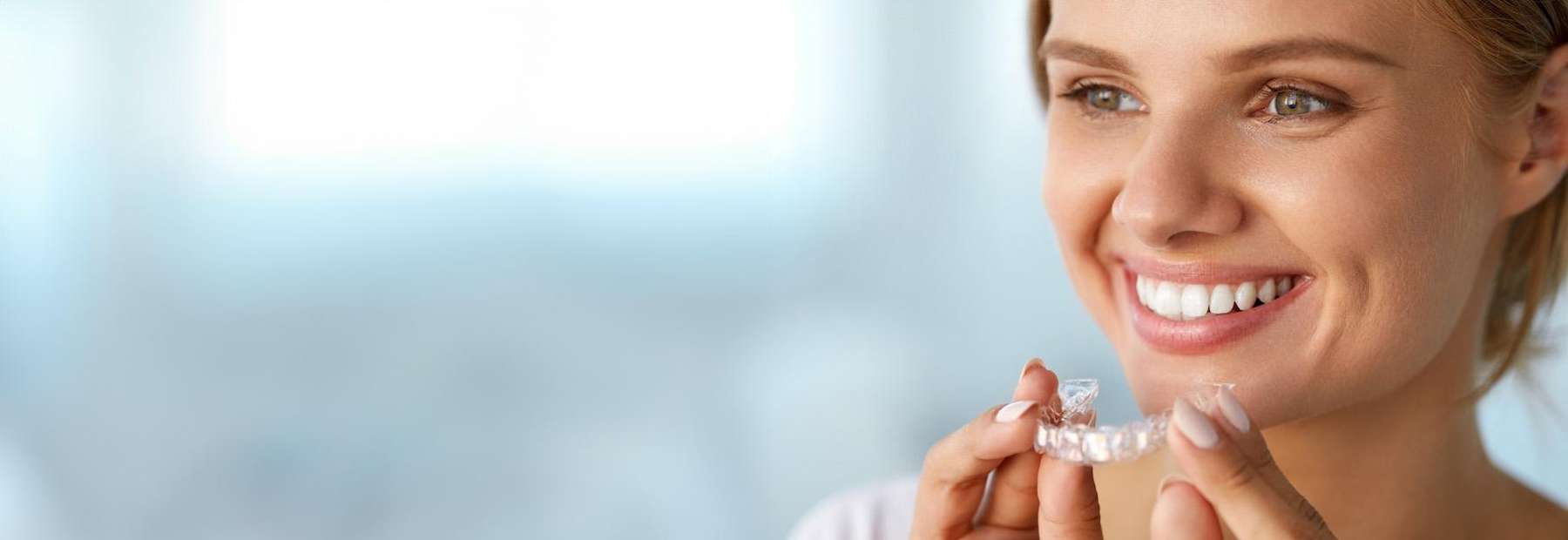 A patient testing out Clear Aligners for the first time in Burnaby, BC