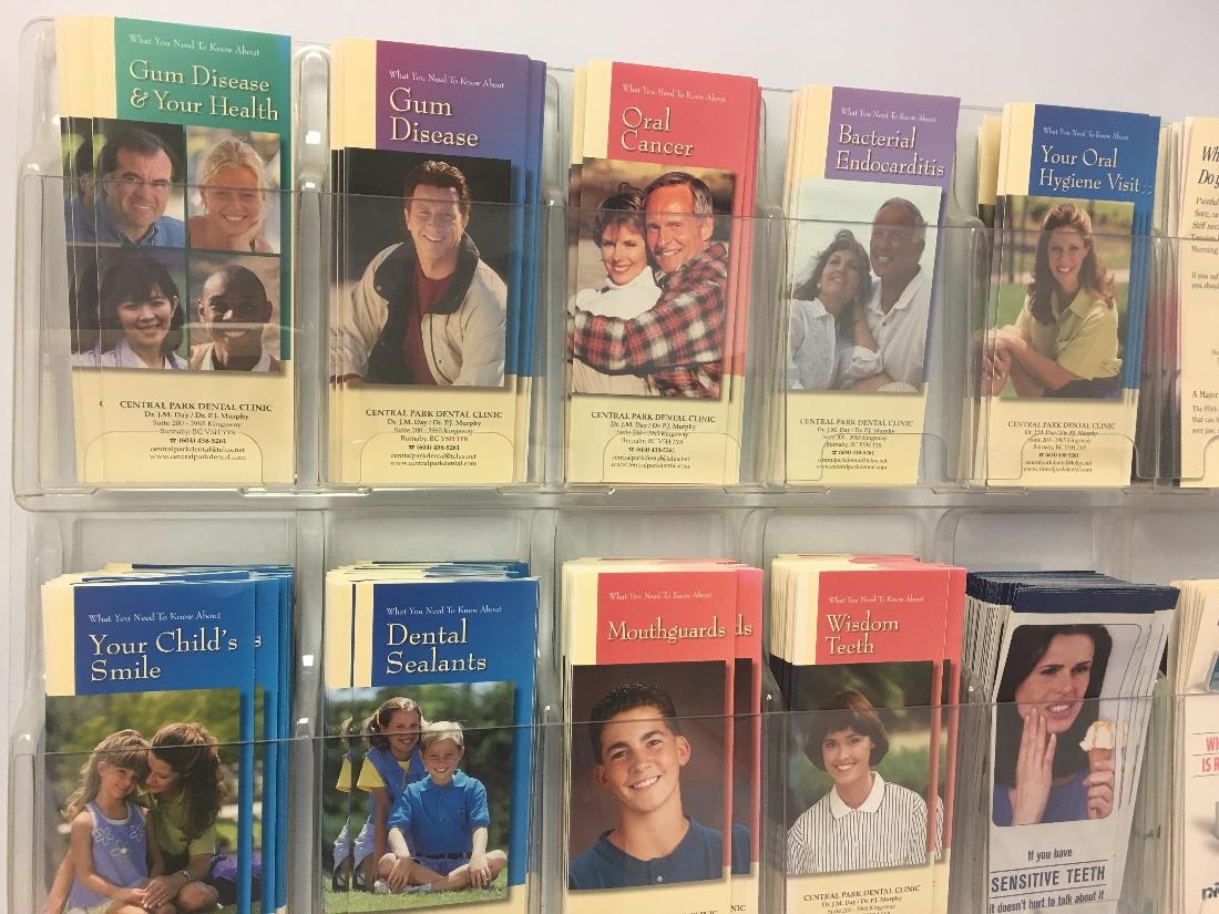 Wall of dental pamphlets in Burnaby