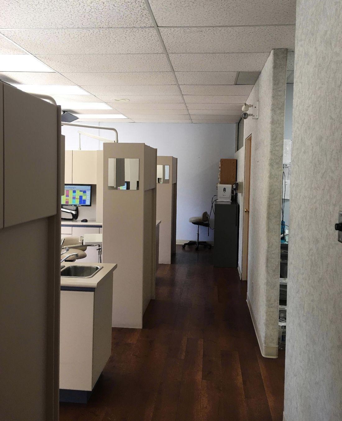 hallway leading to dental chairs